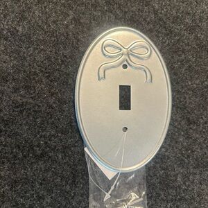 Source Unknown Silver Oval Decorative Single Toggle Wall Plate with Bow Accent